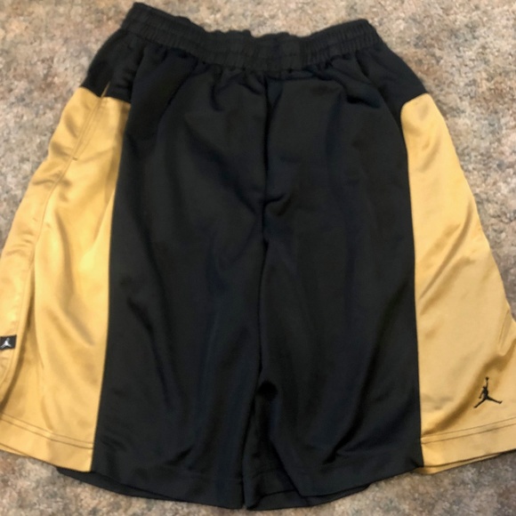 black and gold jordan shorts